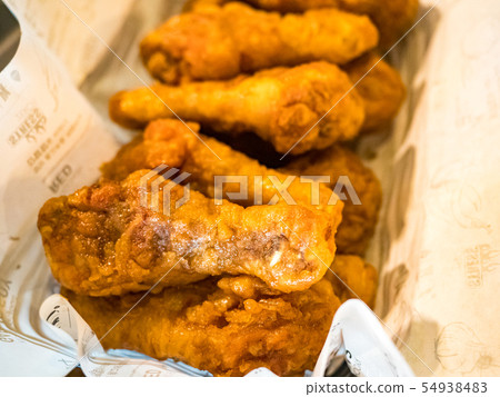 basket of tasty fried chicken tenders 54938483
