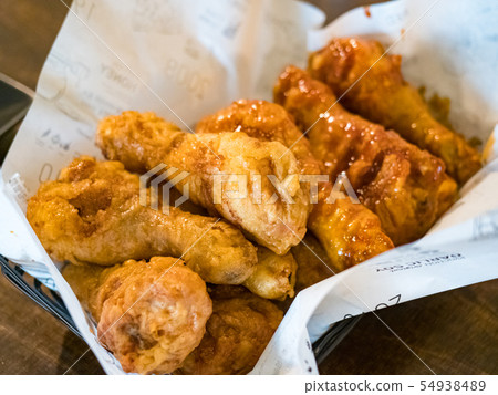 basket of tasty fried chicken tenders 54938489
