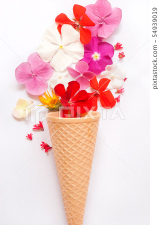 Waffle ice cream cone with flowers Waffle ice cream cone with flowers 54939019