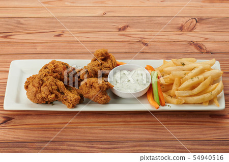 Fried chicken with tartar sauce 54940516