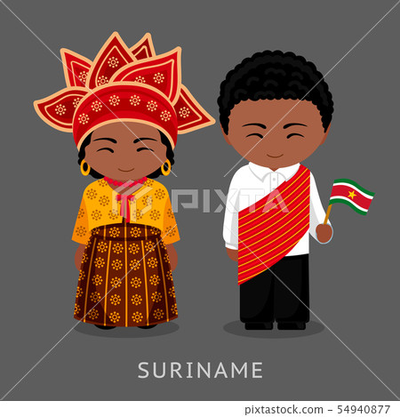 Surinamese in national dress with a flag. Surinamese in national dress with a flag. 54940877