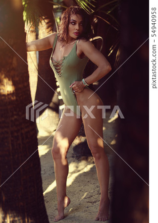 Sexy woman posing on nature 54940958