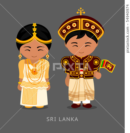 Sri Lankans in national dress with a flag. 54940974