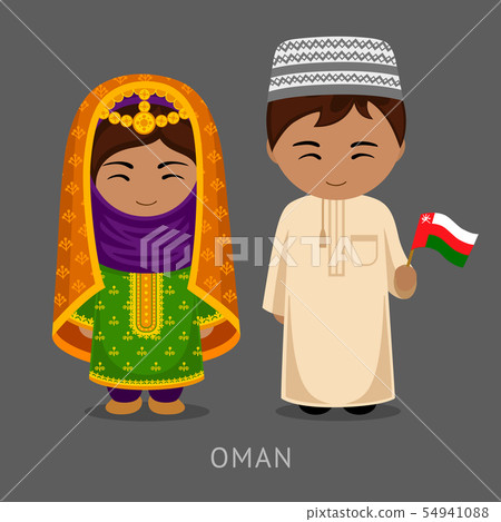 Omani in national dress with a flag. 54941088