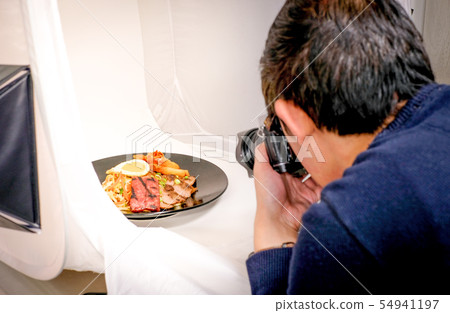 professional man food photography with camera ligh 54941197