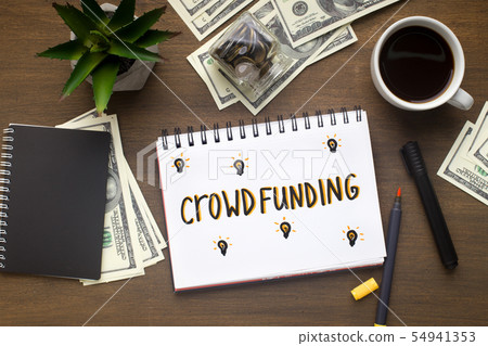 Distribution of money on crowdfunding, flat lay on office table 54941353