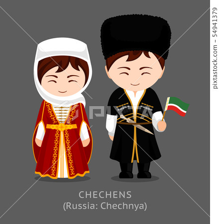 Algerians in national dress with a flag. Algerians in national dress with a flag. 54941379