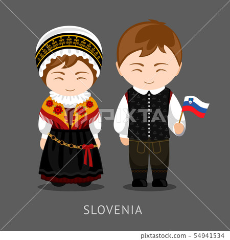 Slovenes in national dress with a flag. Slovenes in national dress with a flag. 54941534