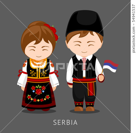 Serbs in national dress with a flag. Serbs in national dress with a flag. 54941537