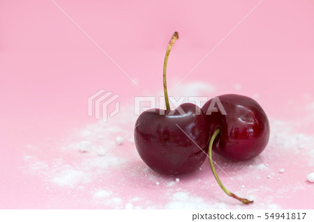 Two cherries isolated on pink background top view, healthy concept modern design powdered sugar 54941817