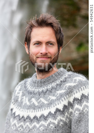 Portrait of man in Icelandic sweater outdoor 54942631