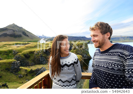 Tourist couple on romantic travel on Iceland Tourist couple on romantic travel on Iceland 54942643