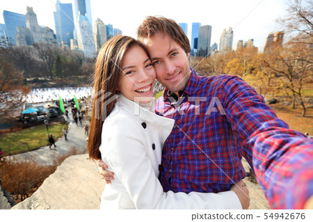 Dating couple in love, Central park, New York City Dating couple in love, Central park, New York City 54942676