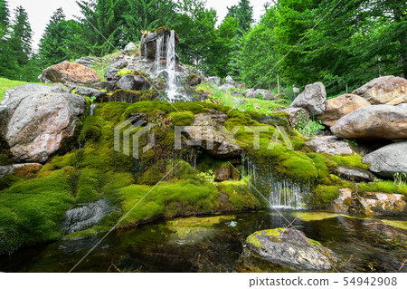 Waterfall mountain view close up. Mountain river Waterfall mountain view close up. Mountain river 54942908