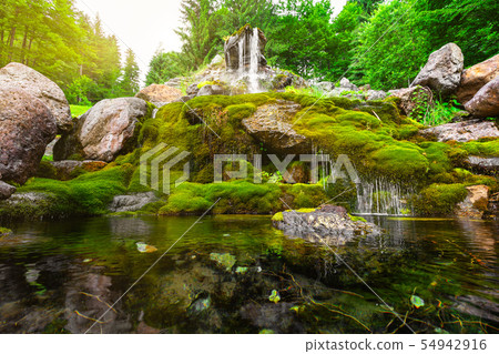 Waterfall mountain view close up. Mountain river Waterfall mountain view close up. Mountain river 54942916