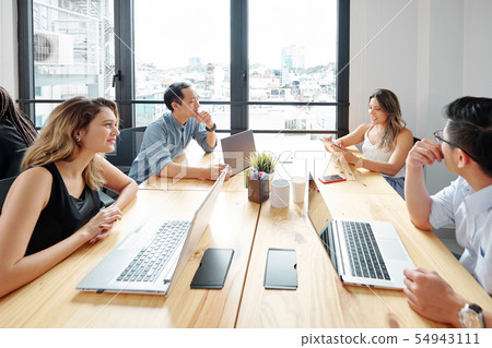 People working with laptops at office 54943111