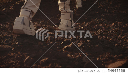 Two astronauts walking on Mars 54943366
