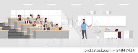 students sitting at college lecture hall and listening to university male professor over chalkboard students sitting at college lecture hall and listening to university male professor over chalkboard 54947434