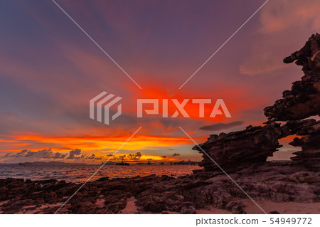 sunset above the rock at Kwang beach Krabi sunset above the rock at Kwang beach Krabi 54949772