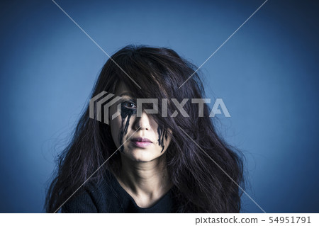 A woman who sheds tears A woman who sheds tears 54951791
