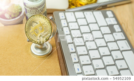 bitcoin currency on office table 54952109