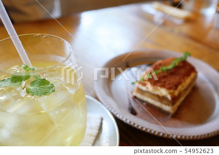 Summer teatime cold drinks and cake Summer teatime cold drinks and cake 54952623
