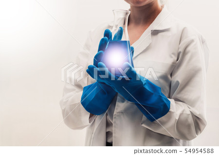 Woman scientist working in chemist laboratory. 54954588