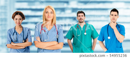 Doctor working in hospital with other doctors. Doctor working in hospital with other doctors. 54955236
