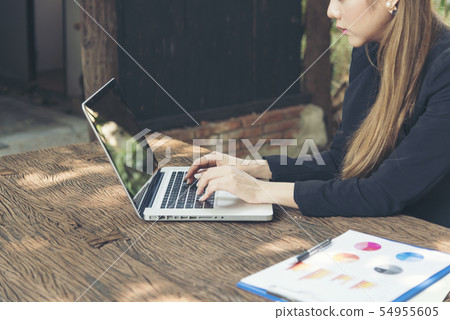 Beautiful businesswoman using laptop working 54955605