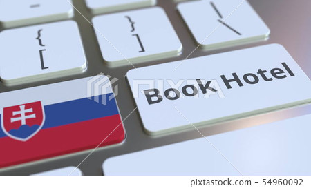BOOK HOTEL text and flag of Slovakia on the buttons on the computer keyboard. Travel related 54960092
