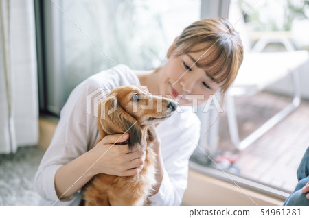 Life with a dog Woman 54961281