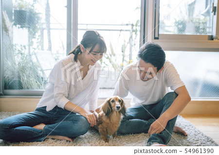 Living with a dog Couple Couple Living with a dog Couple Couple 54961390