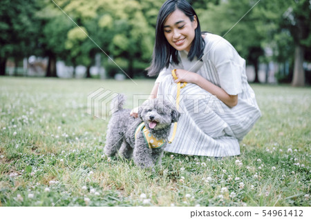Life with a dog Woman 54961412