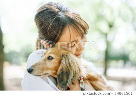 Life with a dog Woman 54961501