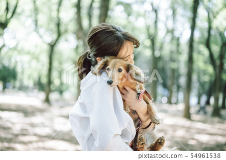 Life with a dog Woman Life with a dog Woman 54961538