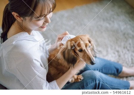 Life with a dog Woman 54961612