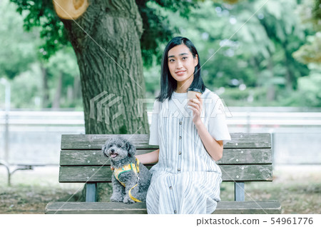 Life with a dog Woman 54961776