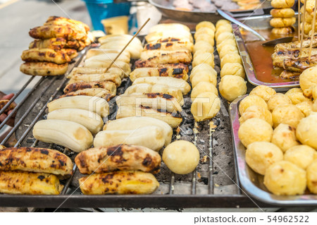 Grilled banana and sweet potato for sale in market 54962522