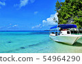 Tropical beach and white boat 54964290