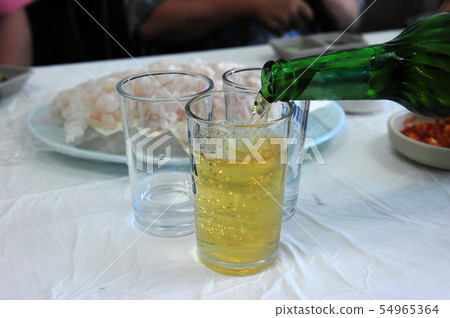 Following a drink in a cup Following a drink in a cup 54965364