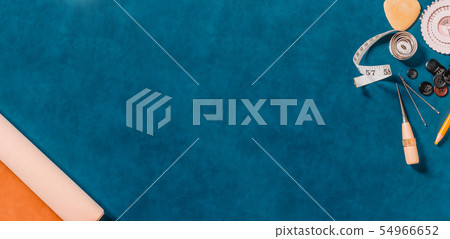 Crafting tools on natural leather on background. Crafting tools on natural leather on background. 54966652