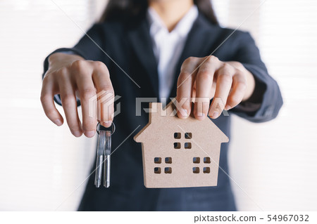 hand of Asian business woman are holding key hand of Asian business woman are holding key 54967032
