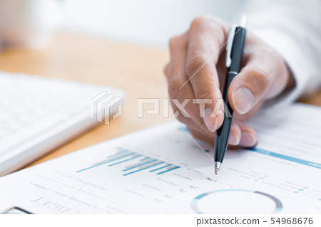 Close-up of hands Businessman reading and writing 54968676