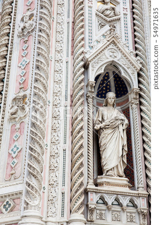 Statue on the facade of the  Florence Cathedral 54971635