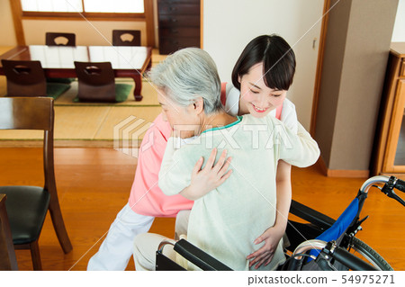 Nursing care senior female helper caregiver 54975271