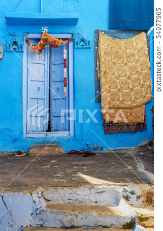 Old wood carved door in Blue City of Jodhpur. 54977905
