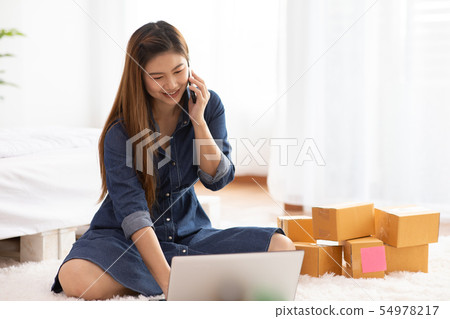 SME women working with laptop for Online shopping 54978217