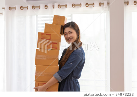 SME women working with laptop for Online shopping SME women working with laptop for Online shopping 54978228