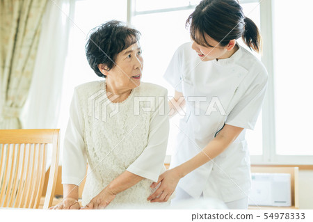 Physiotherapist PT woman Physiotherapist PT woman 54978333