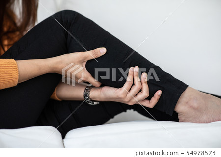 woman have a Calf leg pain 54978573